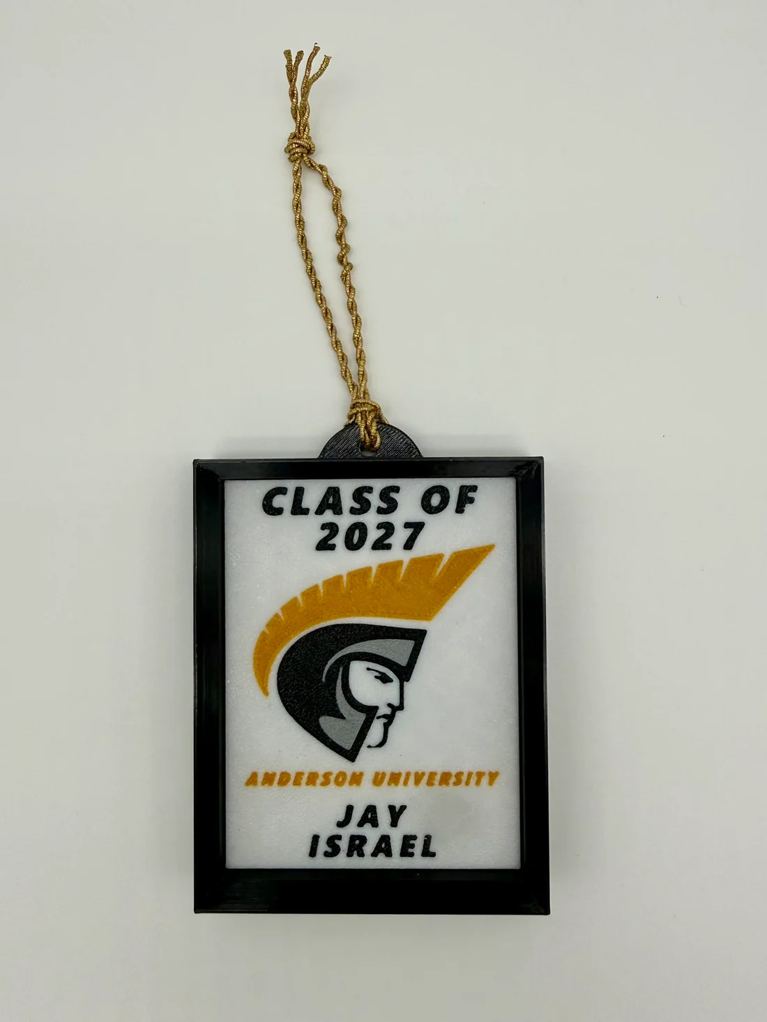 Black framed class of 2027 graduation ornament with a school logo